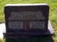 Headstone for Clayton Ashley Raynor and Cora Isis Johnson