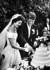 John and Jacqueline Kennedy cut wedding cake