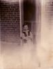 Glenna Fordham, age 5 or 6, in front of their home in Greenville, Utah