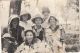 Jeanette Fordham (in bonnet at left) and her childhood friends