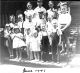 Harry Clemence Homer with a group of children