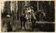 Elbert, Floyd, and Ted Michael riding a horse