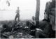 WWII - Soldiers resting on battlefield