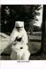 Alta Nott Robbins, seated in her nurses uniform, knitting