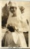 Alta Nott Robbins in her nurses uniform, knitting