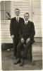Elder Hubert Eugene Record (standing) and Elder Streetor Wallace