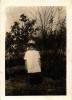 June Smith, playing with a pot on her head, about 1927