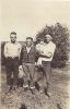 Edward Vern Smith & brother, Henry (Hank) and Chester Lee 'Ted' Michael, with June Smith, about 1 year old, in Uncle Ted's arms