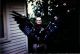 Paul Henry Wagner in front of home on LaView, holding dead eagle found in Eastern Oregon, June 1966
